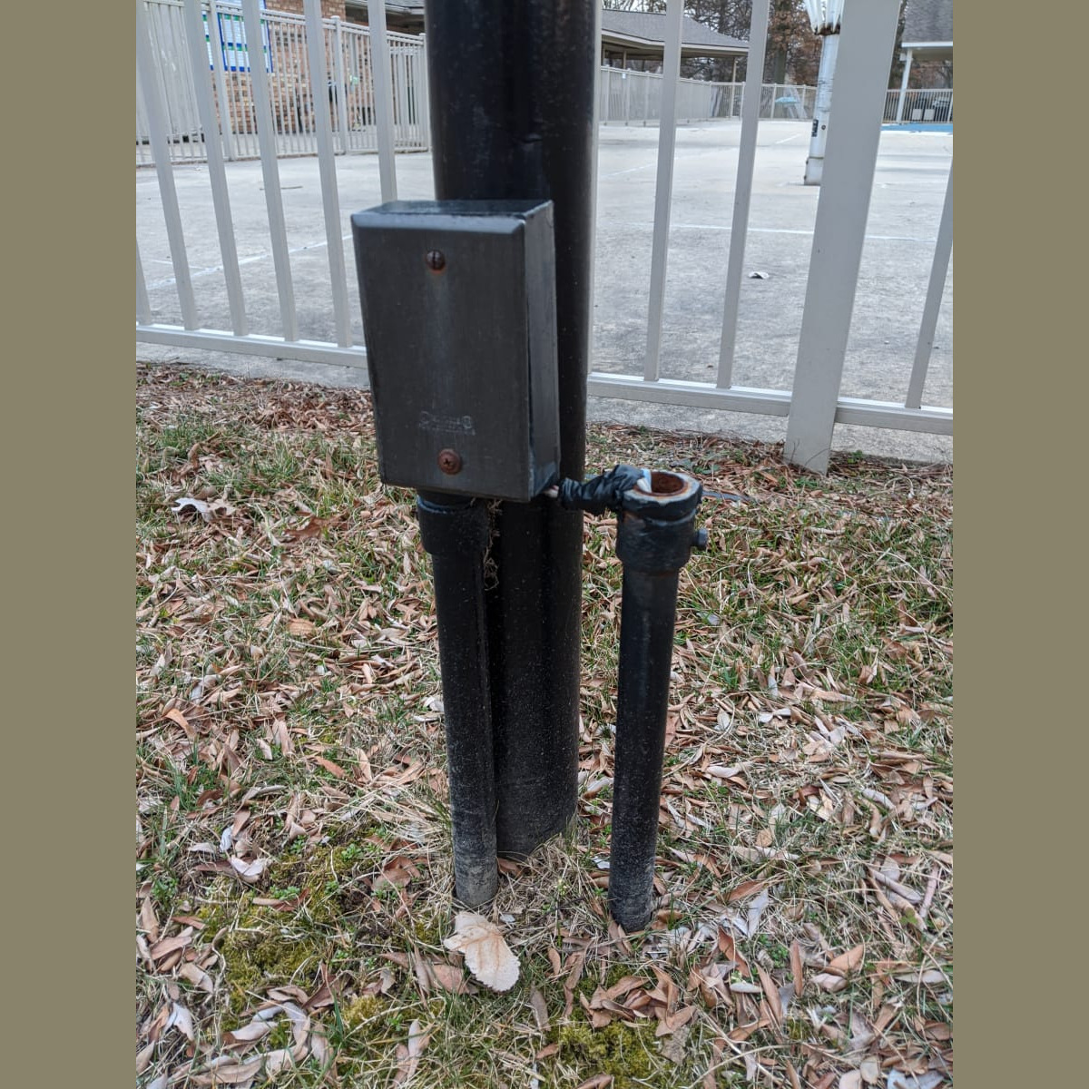 A view of the old wiring in March 2020, near the playground. At the time this photo was taken, the wiring had already been disconnected from an electricity source (no connection in the breaker panel). Old Wiring