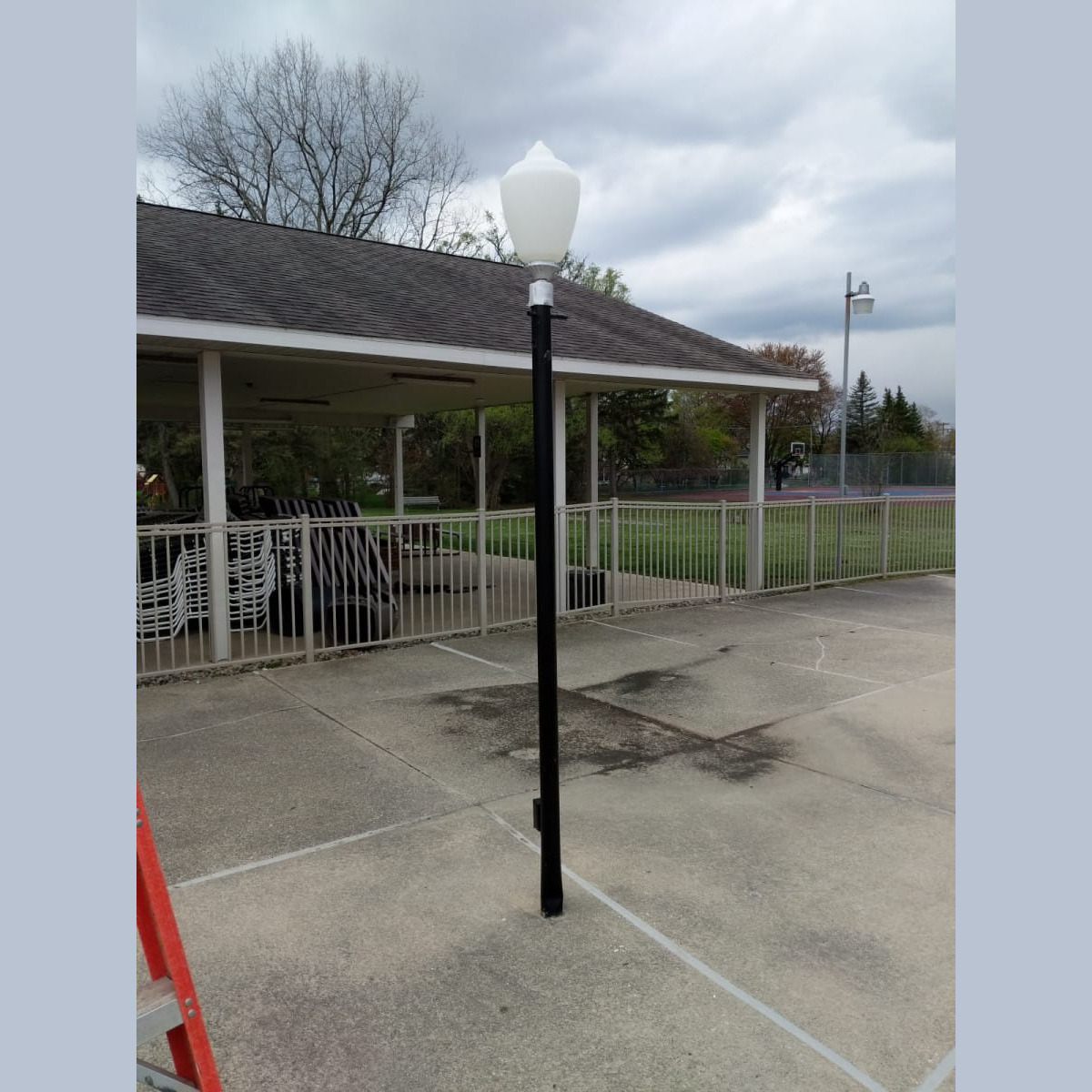 A view of the first lamp, before permanent installation on May 10th, 2020. At this point, the lamp fitter (raw aluminum color) had yet to be painted. Test Fit in May 2020