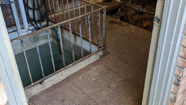 The old floor and railing on July 20th, 2020. Old Floor and Surge Tank Railing
