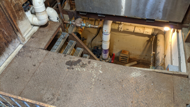 The old floor (note the lack of railing) on July 20th, 2020. Old Floor and Staircase Near Boiler