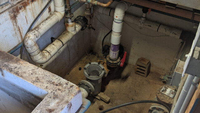 A view of the pump house after removal of the old floor on November 3rd, 2020 (prior to cleanup and removal of old piping). Old Floor Removed (3 of 3)