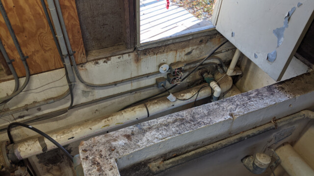 A view of the pump house after removal of the old floor on November 3rd, 2020 (prior to cleanup and removal of old piping). Old Floor Removed (2 of 3)