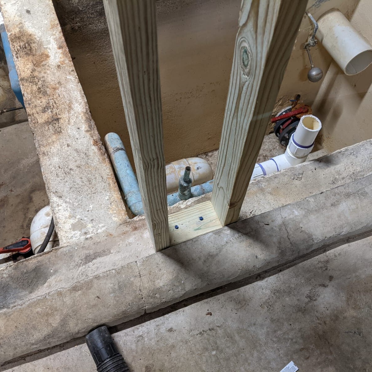 New treated lumber pipe support structure installed after removal of the old floor on November 29th, 2020. New Pipe Support Structure