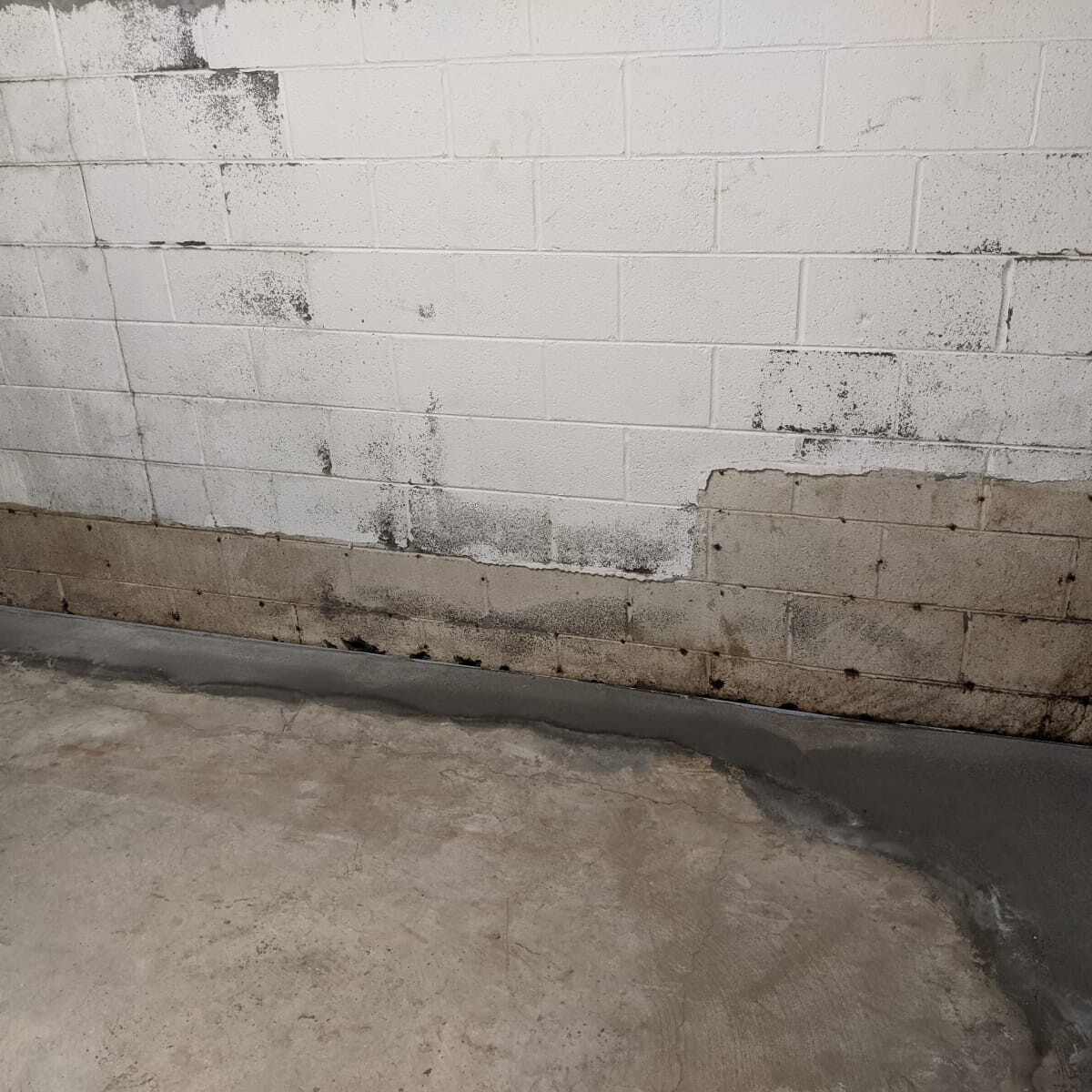 New concrete pour on the south end. New Concrete on South Wall in January 2021