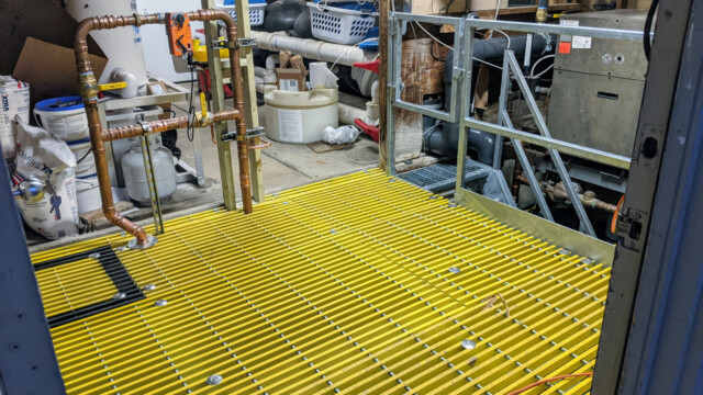 A view of the new floor (and piping) on January 11th, 2021. New Floor (View From Door)
