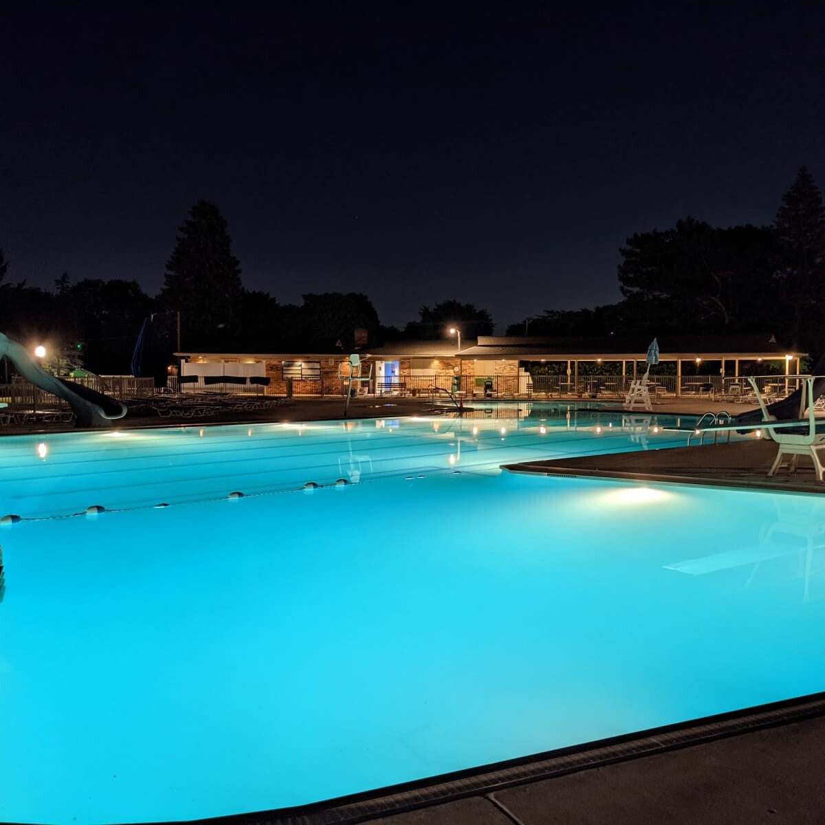 A view of the pool deck at night on June 10th, 2021. Pool Deck at Night in June (1 of 2)
