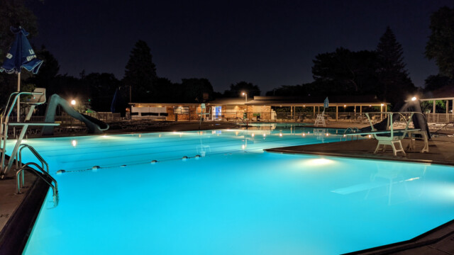 A view of the pool deck at night on June 10th, 2021. Pool Deck at Night in June (1 of 2)