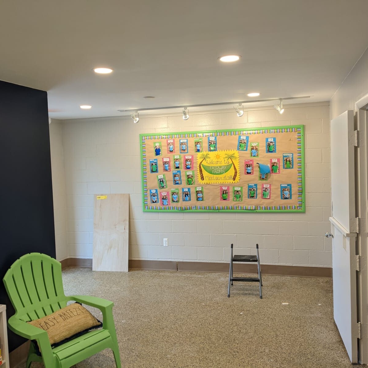 A view of the nearly-completed south wall of the clubhouse lobby, as taken on April 13th, 2022. Note that the 2021 staff photos are still posted at this point. Nearly Completed South Wall #1