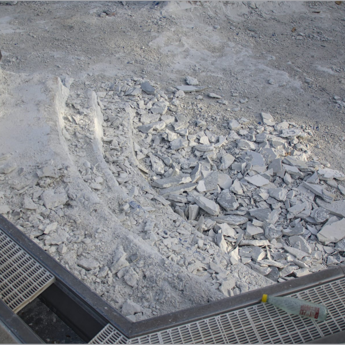 The north staircase in the main pool. Note that some gutter grates were intentionally removed here to support measurements for the aforementioned 3D printing project. Demolition - Day 6