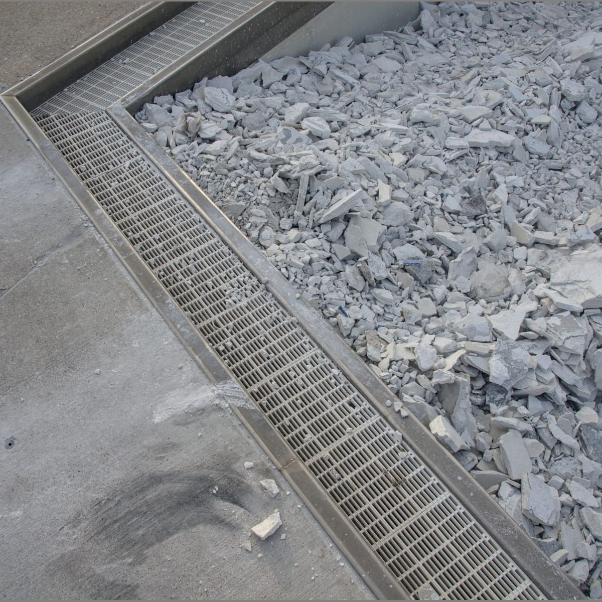 A closer look at the ramp in the baby pool during evaluation of the damage from debris. Demolition - Day 6