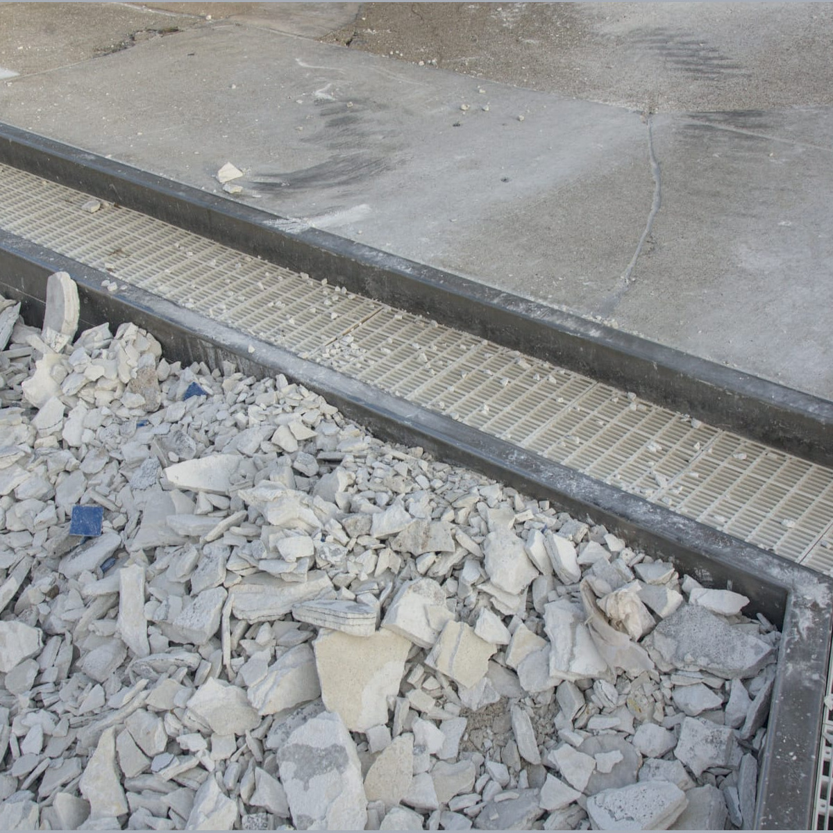 A closer look at the ramp in the baby pool during evaluation of the damage from debris. Demolition - Day 6