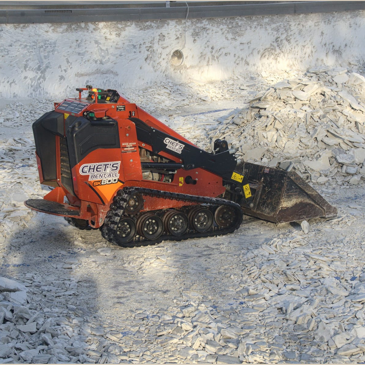 A closer view of the crew's debris loader. Demolition - Day 6